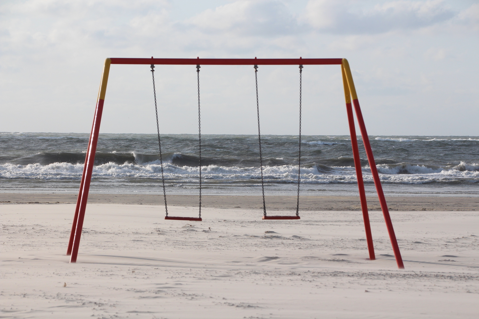 Empty swings at the beach in Langeoog, Germany
