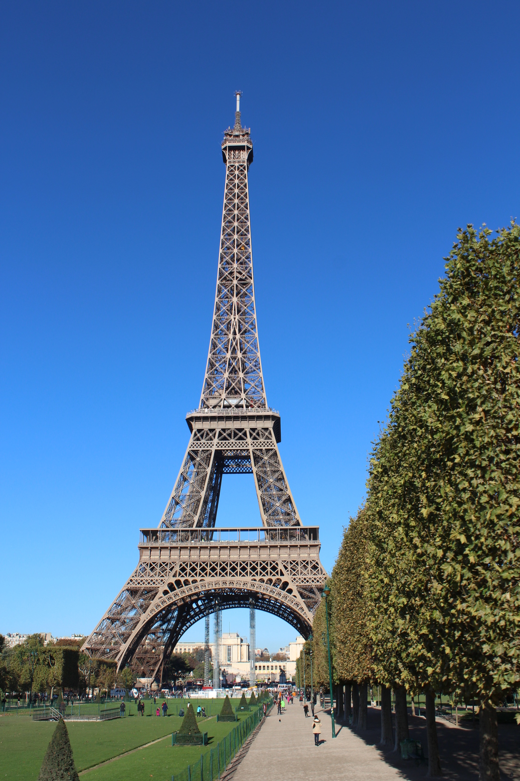 The Eiffel Tour in Paris with a beautifu blue sky in the background